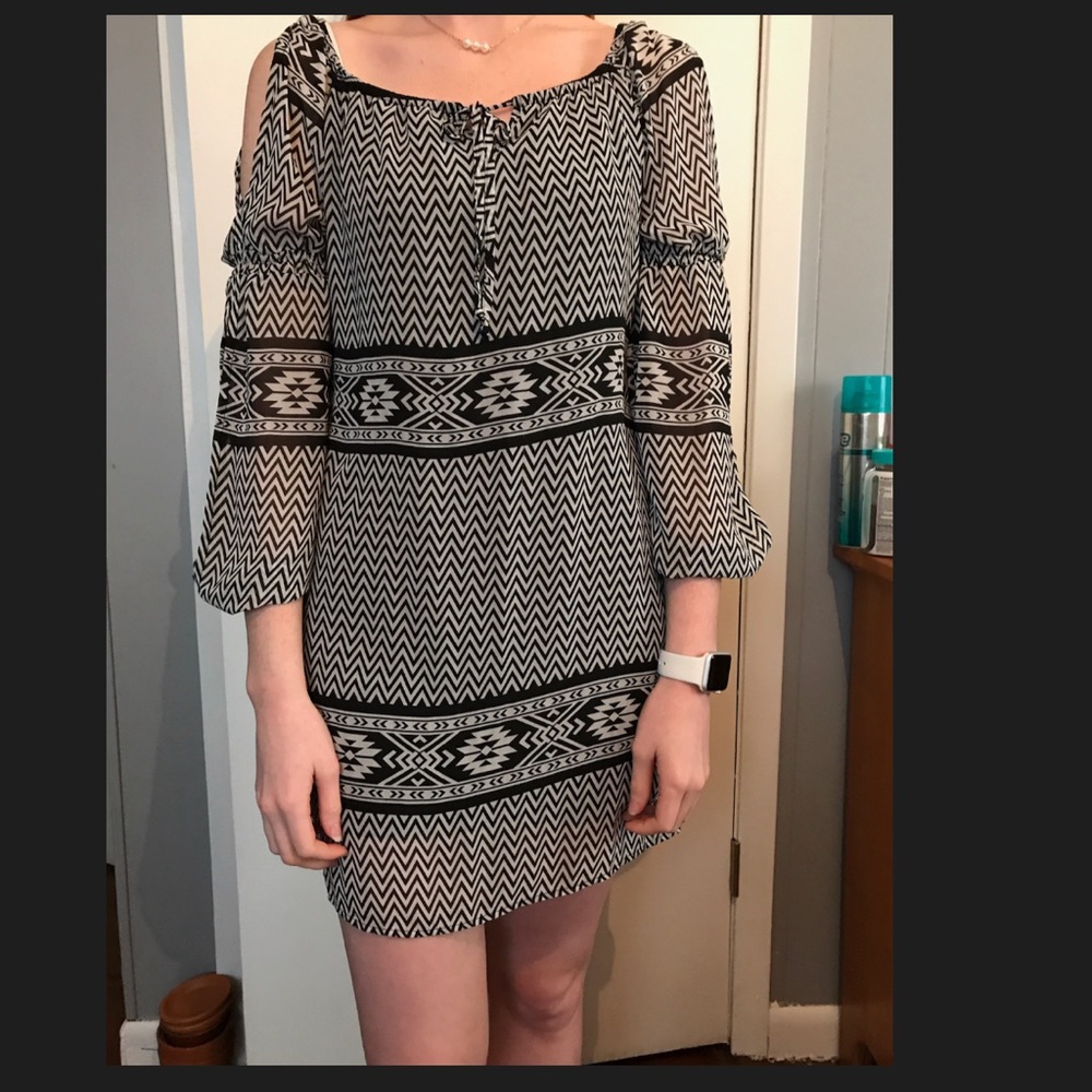 Turn heads in this trendy boutique dress!